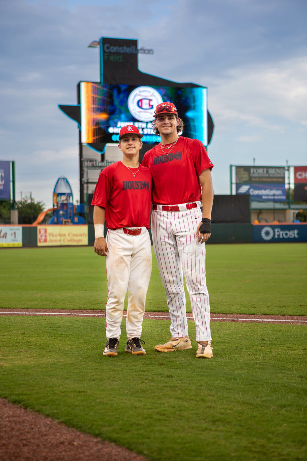 Cole Kaase and Brady Englett pose for a photo together after Tuesday's GHBCA Seniors All-Star game at Constellation Field in Sugar Land.